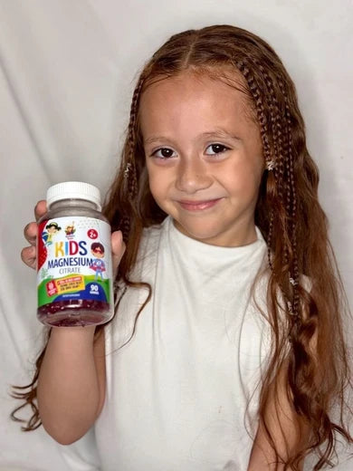 A Sunny Sam community member holding a bottle of gummies