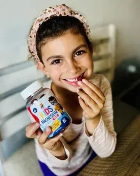 A child holding Sunny Sam gummies